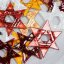 Vánoční skleněná ozdoba hvězda jantarová transparentní - zlaté hvězdičky