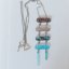 Glass necklace turquoisebrown ladder NH0401