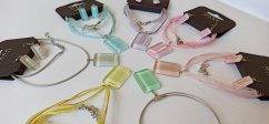 Glass jewelry set in soft pastel colors
