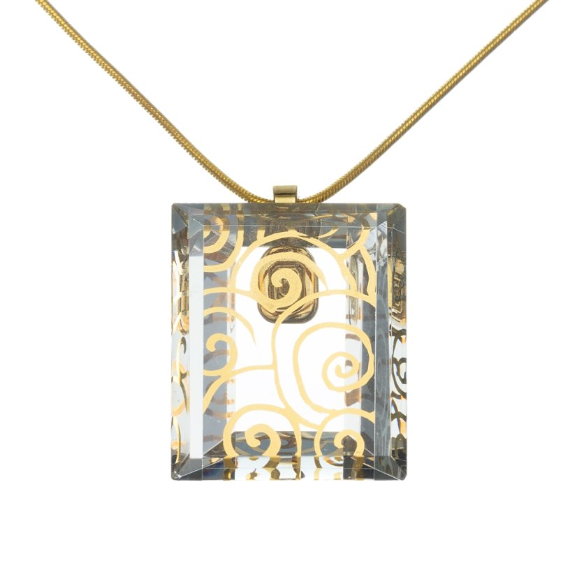 Cut clear glass jewelry with gold spirals
