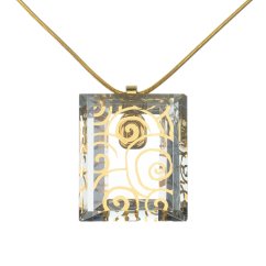 Cut clear glass jewelry with gold spirals