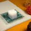 Glass turquoise candlestick MIRA with scented candle